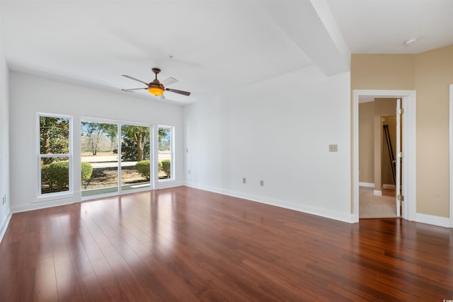 1025 World Tour Blvd Unit 101A, Myrtle Beach, SC 29579 - unfurnished living room with a ceiling fan, wood finished floors, and baseboards