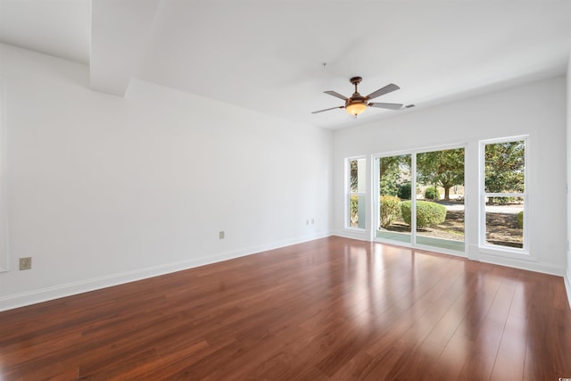 1025 World Tour Blvd Unit 101A, Myrtle Beach, SC 29579 - spare room featuring wood finished floors, baseboards, and a ceiling fan