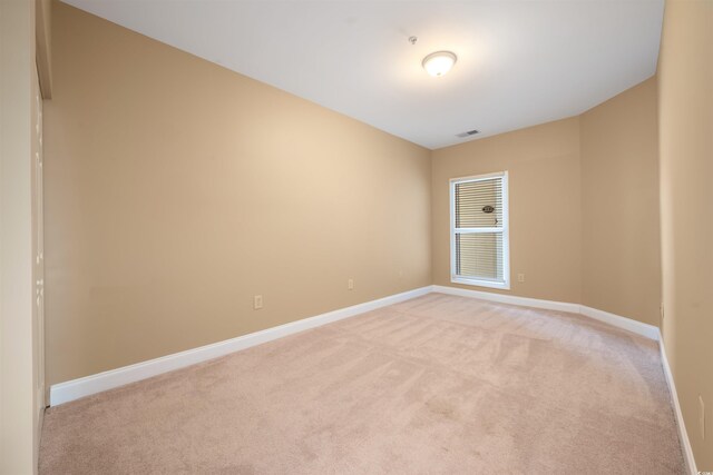 1025 World Tour Blvd Unit 101A, Myrtle Beach, SC 29579 - spare room with light colored carpet and baseboards