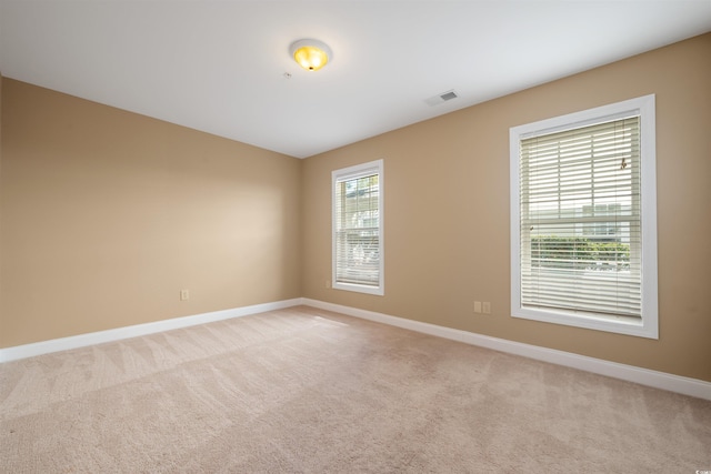 1025 World Tour Blvd Unit 101A, Myrtle Beach, SC 29579 - unfurnished room featuring baseboards and light carpet