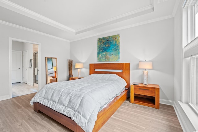 5834 Cremona Dr, Myrtle Beach, SC 29577 - bedroom featuring a tray ceiling, wood finished floors, crown molding, and baseboards