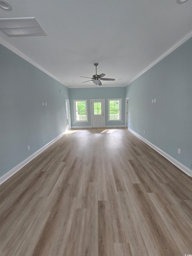 605 15th Ave S, North Myrtle Beach, SC 29582 - empty room with ceiling fan, ornamental molding, baseboards, and wood finished floors