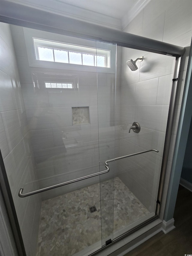 605 15th Ave S, North Myrtle Beach, SC 29582 - full bathroom with a shower stall, ornamental molding, and wood finished floors