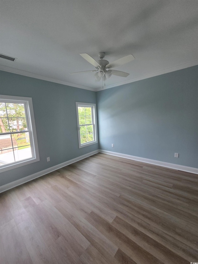605 15th Ave S, North Myrtle Beach, SC 29582 - unfurnished room featuring ornamental molding, wood finished floors, a ceiling fan, and baseboards