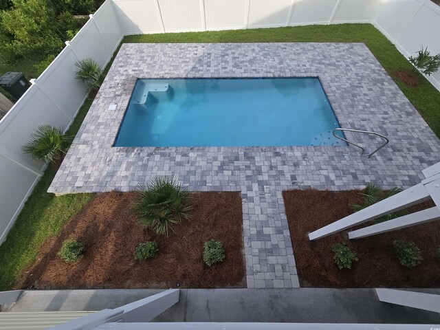 605 15th Ave S, North Myrtle Beach, SC 29582 - view of pool with a fenced backyard and a patio area