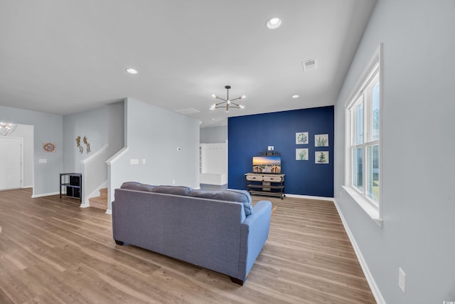 3304 Candytuft Dr, Conway, SC 29526 - living room featuring a chandelier, stairway, light wood finished floors, and recessed lighting