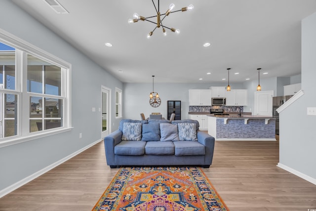 3304 Candytuft Dr, Conway, SC 29526 - living area featuring a chandelier, light wood-type flooring, and recessed lighting