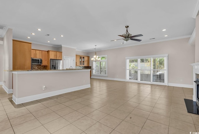 unfurnished living room featuring light tile patterned floors, baseboards, recessed lighting, and ceiling fan with notable chandelier