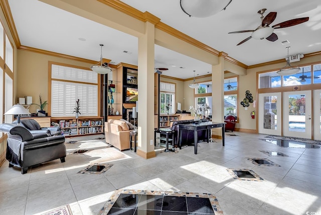 tiled living room with baseboards, visible vents, a ceiling fan, and crown molding