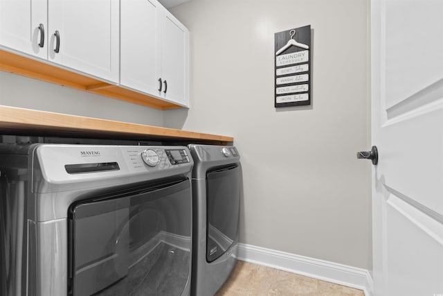 134 Winding Path Dr, Loris, SC 29569 - washroom featuring cabinet space, baseboards, and separate washer and dryer