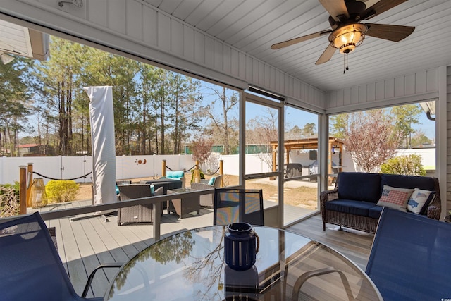 134 Winding Path Dr, Loris, SC 29569 - sunroom / solarium featuring an outdoor hangout area, a ceiling fan, outdoor dining space, and plenty of natural light