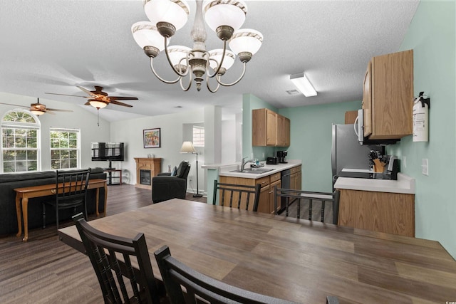 4305 Lotus Ct Unit G, Murrells Inlet, SC 29576 - dining space with a chandelier, dark wood finished floors, a textured ceiling, a ceiling fan, and lofted ceiling