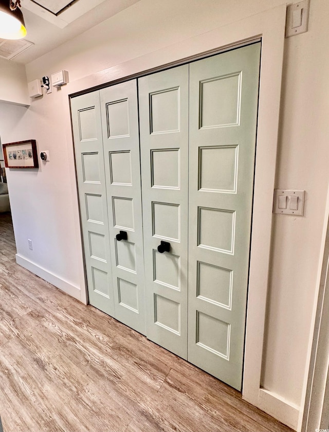 details with baseboards and wood finished floors