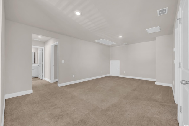 unfurnished room with carpet, recessed lighting, and baseboards