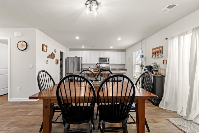 380 Harvest Ridge Way, Conway, SC 29527 - dining room with recessed lighting, baseboards, visible vents, and wood finished floors