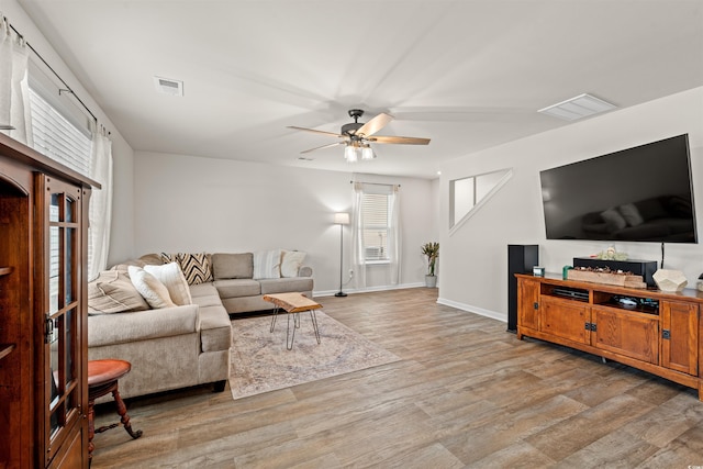380 Harvest Ridge Way, Conway, SC 29527 - living room featuring a ceiling fan, baseboards, visible vents, and wood finished floors