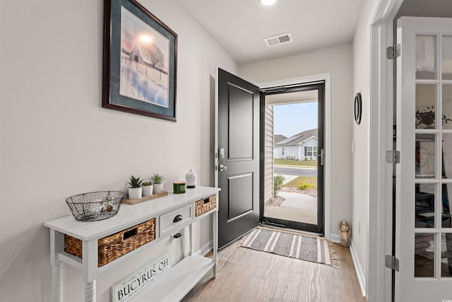 380 Harvest Ridge Way, Conway, SC 29527 - doorway featuring baseboards, light wood-type flooring, and visible vents
