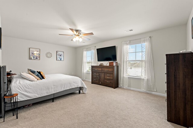 380 Harvest Ridge Way, Conway, SC 29527 - bedroom with baseboards, light colored carpet, ceiling fan, and visible vents