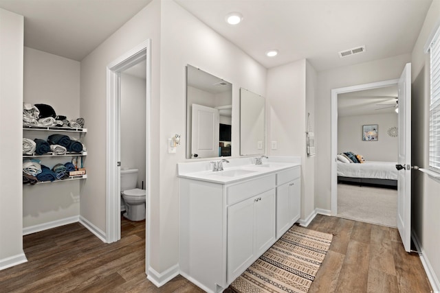 380 Harvest Ridge Way, Conway, SC 29527 - ensuite bathroom featuring ceiling fan, toilet, wood finished floors, and visible vents