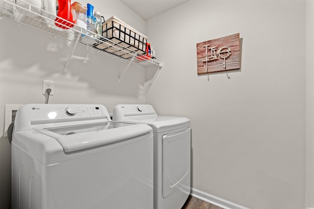 380 Harvest Ridge Way, Conway, SC 29527 - clothes washing area with independent washer and dryer, laundry area, baseboards, and wood finished floors