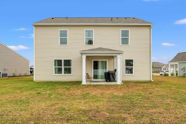 380 Harvest Ridge Way, Conway, SC 29527 - back of property with a lawn, a patio, and central AC unit