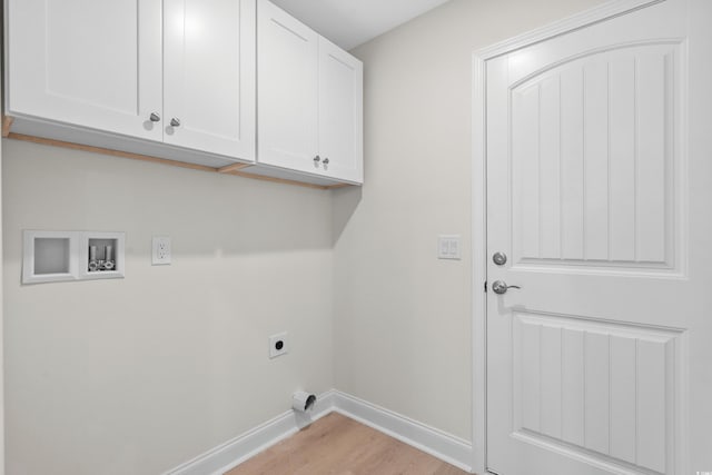 washroom with cabinet space, electric dryer hookup, light wood-style flooring, baseboards, and hookup for a washing machine