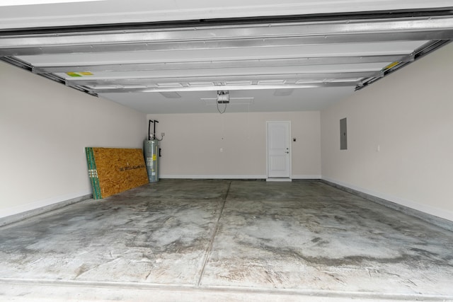 garage featuring a garage door opener, water heater, electric panel, and baseboards