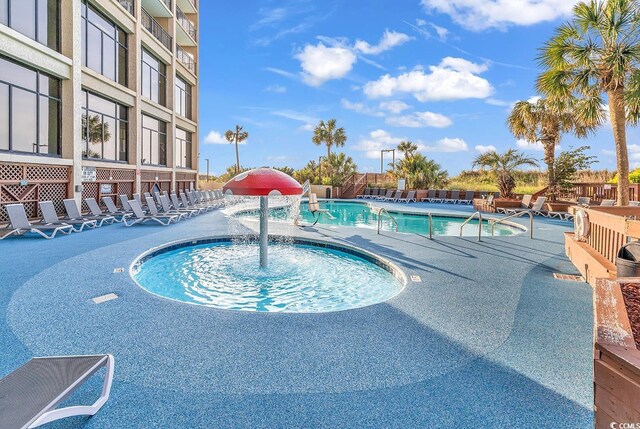 pool featuring a patio area