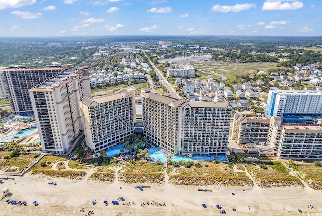birds eye view of property with a city view