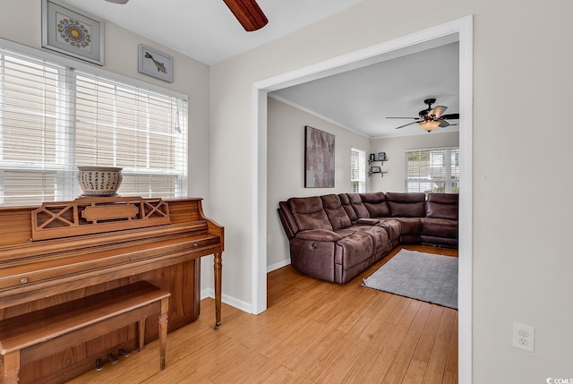 2629 Scarecrow Way, Myrtle Beach, SC 29579 - living area featuring a ceiling fan, light wood-style floors, and baseboards