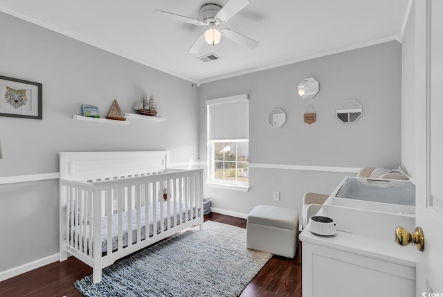 2629 Scarecrow Way, Myrtle Beach, SC 29579 - bedroom featuring a nursery area, crown molding, wood finished floors, baseboards, and ceiling fan
