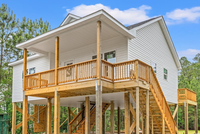 3566 Steamer Trace Rd, Conway, SC 29527 - rear view of property featuring a carport, stairway, and a deck
