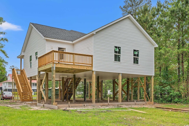 3566 Steamer Trace Rd, Conway, SC 29527 - back of property featuring a carport, stairs, roof with shingles, a wooden deck, and a lawn