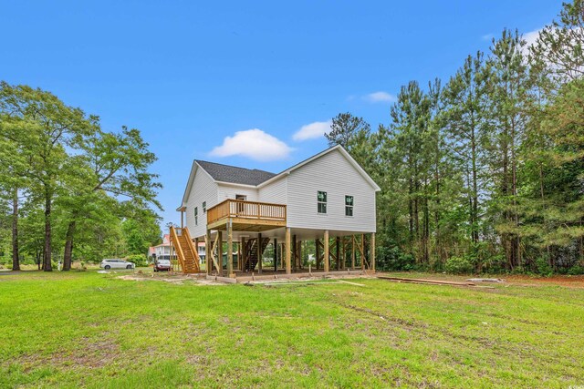 3566 Steamer Trace Rd, Conway, SC 29527 - back of property with stairway, a yard, and a wooden deck