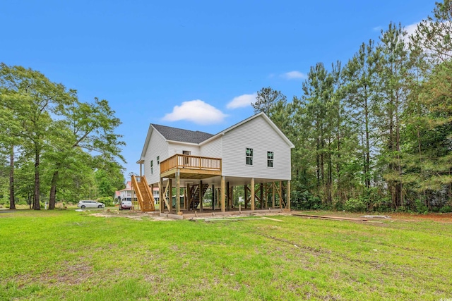 3566 Steamer Trace Rd, Conway, SC 29527 - rear view of property featuring stairs, a yard, and a wooden deck