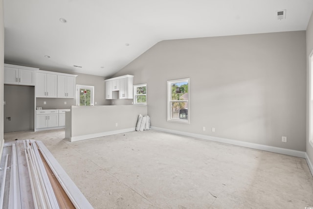 3566 Steamer Trace Rd, Conway, SC 29527 - unfurnished living room featuring vaulted ceiling and baseboards
