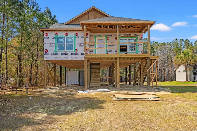 3566 Steamer Trace Rd, Conway, SC 29527 - view of front of property with a carport, roof with shingles, stairs, and a front lawn