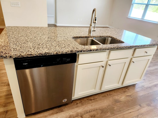5088 Wavering Place Loop, Myrtle Beach, SC 29579 - kitchen featuring dishwasher, a sink, stone counters, light wood-type flooring, and white cabinets