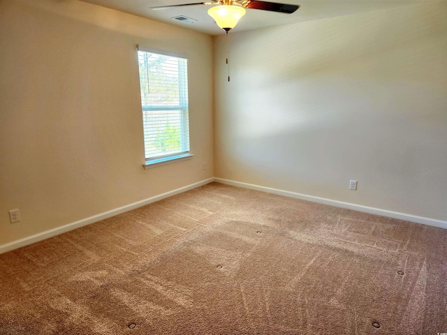 5088 Wavering Place Loop, Myrtle Beach, SC 29579 - spare room with carpet, baseboards, and ceiling fan
