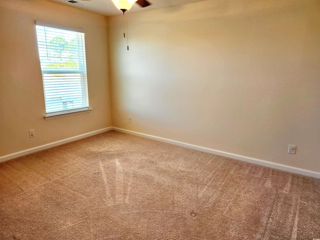 5088 Wavering Place Loop, Myrtle Beach, SC 29579 - spare room featuring carpet flooring, plenty of natural light, and baseboards