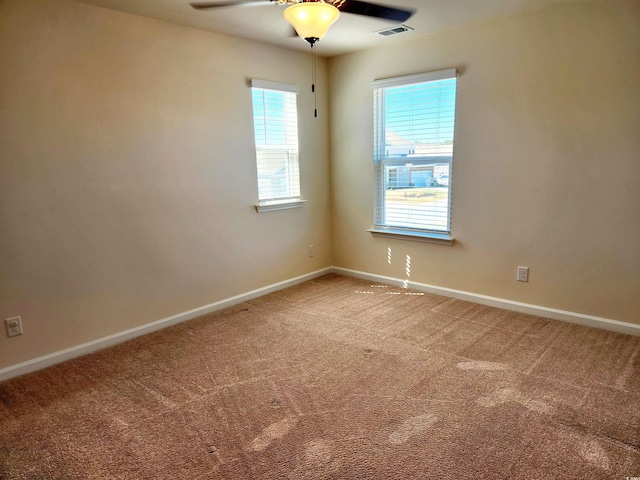 5088 Wavering Place Loop, Myrtle Beach, SC 29579 - unfurnished room featuring light carpet, ceiling fan, and baseboards