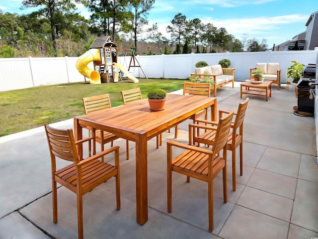 5088 Wavering Place Loop, Myrtle Beach, SC 29579 - view of patio / terrace with outdoor dining area, an outdoor hangout area, and a playground