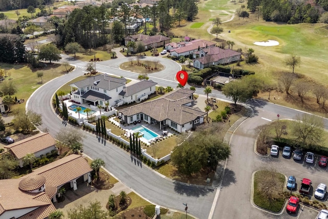 drone / aerial view with view of golf course