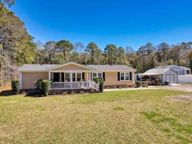 back of house with crawl space, a lawn, and covered porch