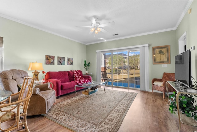 3927 Gladiola Ct Unit 101, Myrtle Beach, SC 29588 - living room featuring wood finished floors, ceiling fan, and ornamental molding