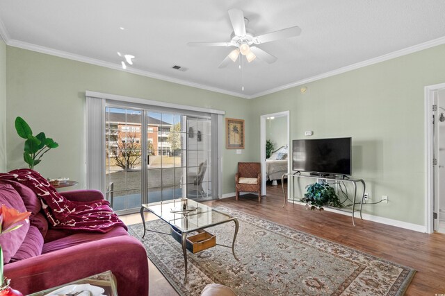 3927 Gladiola Ct Unit 101, Myrtle Beach, SC 29588 - living room with wood finished floors, crown molding, a ceiling fan, and baseboards