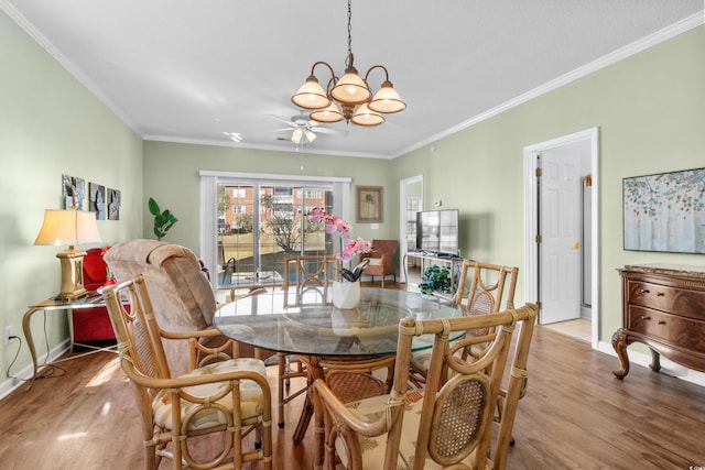 3927 Gladiola Ct Unit 101, Myrtle Beach, SC 29588 - dining room featuring light wood finished floors, ornamental molding, ceiling fan, baseboards, and a chandelier