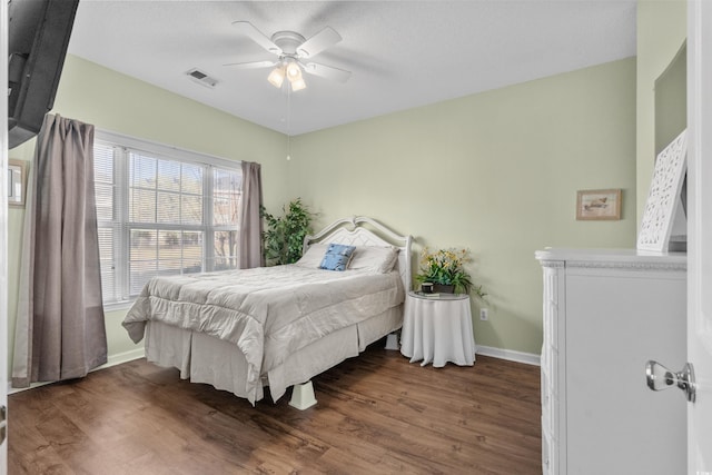 3927 Gladiola Ct Unit 101, Myrtle Beach, SC 29588 - bedroom with wood finished floors, baseboards, and a ceiling fan