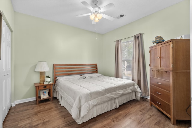 3927 Gladiola Ct Unit 101, Myrtle Beach, SC 29588 - bedroom with wood finished floors, baseboards, a closet, and a ceiling fan
