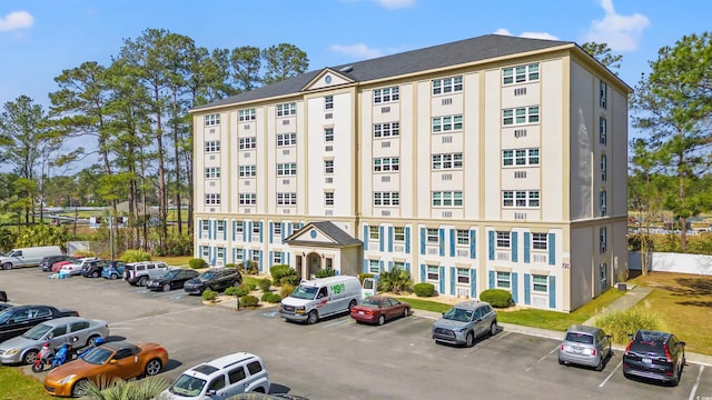 6850 Blue Heron Blvd Unit 205, Myrtle Beach, SC 29588 - view of building exterior featuring uncovered parking